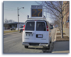 Van with speed sign